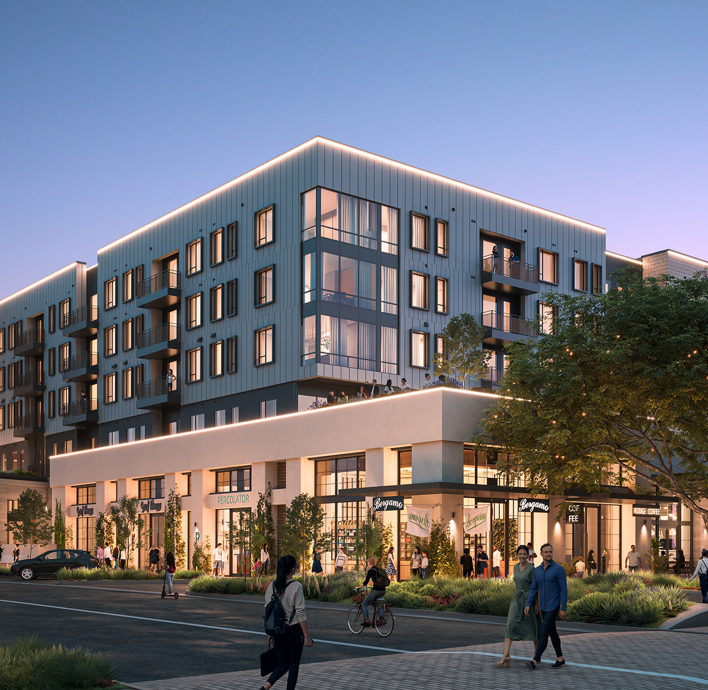 Multi-story apartment buildings clustered around Riverwalk's people-filled Central Green