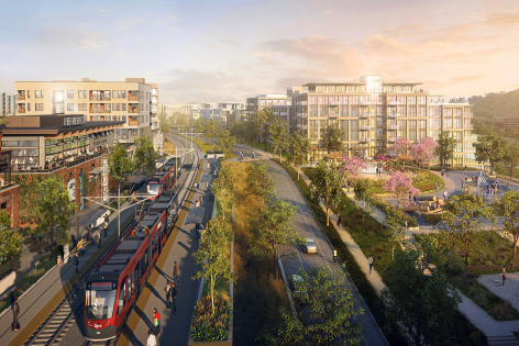 San Diego's Green Line Trolley stopping in the middle of Riverwalk's urban streetscape