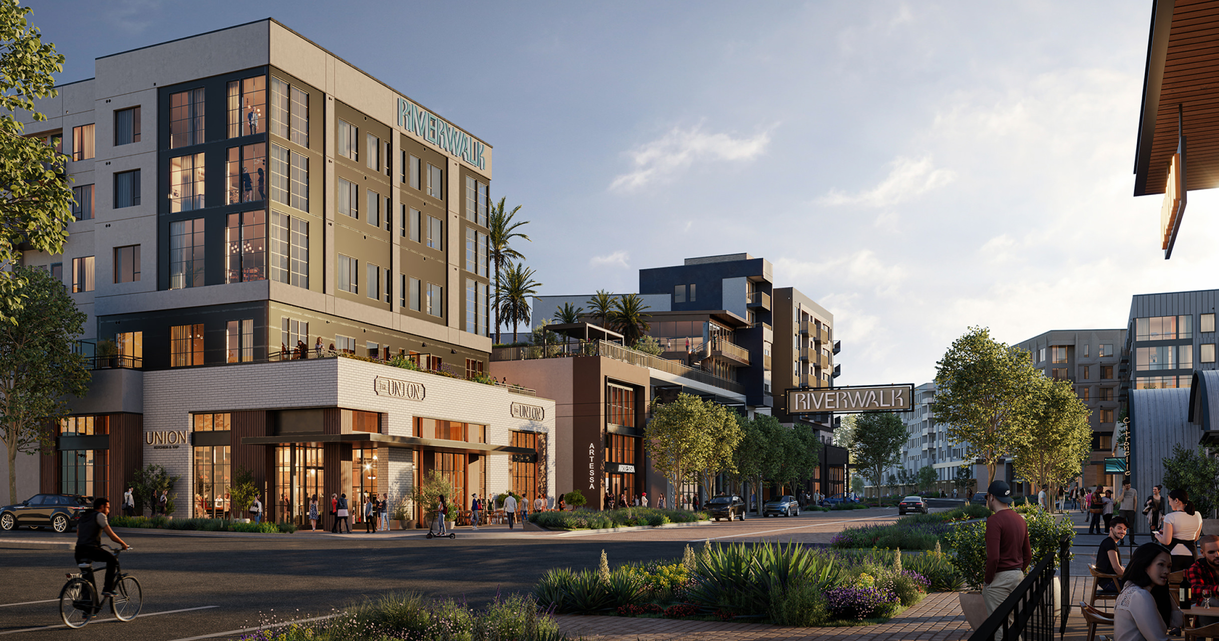 Riverwalk's future clubhouse overlooking a landscaped river bank woven with bike trails and footbridges